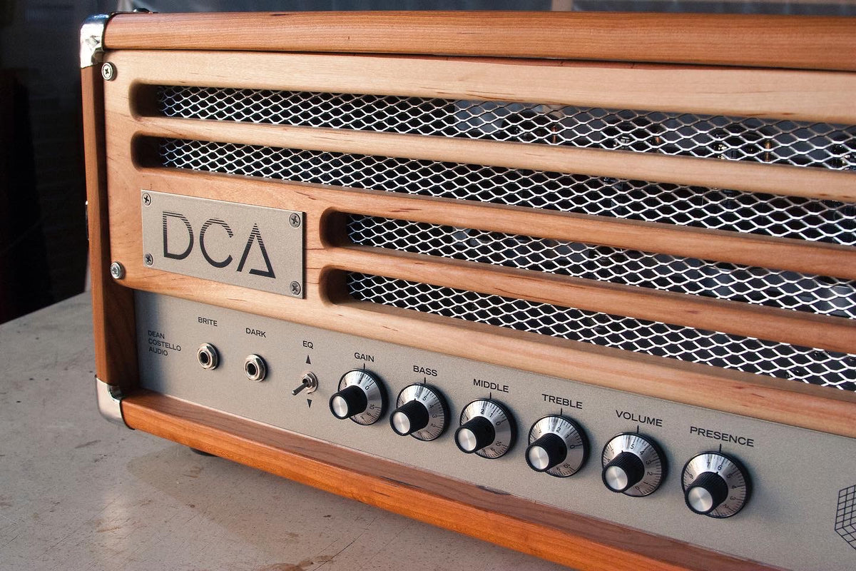 DCA Templates Dean Costello Audio tube amp control panel KT88 craftsman handmade tube audio amp amplifier chicago close up product photography pedal platform